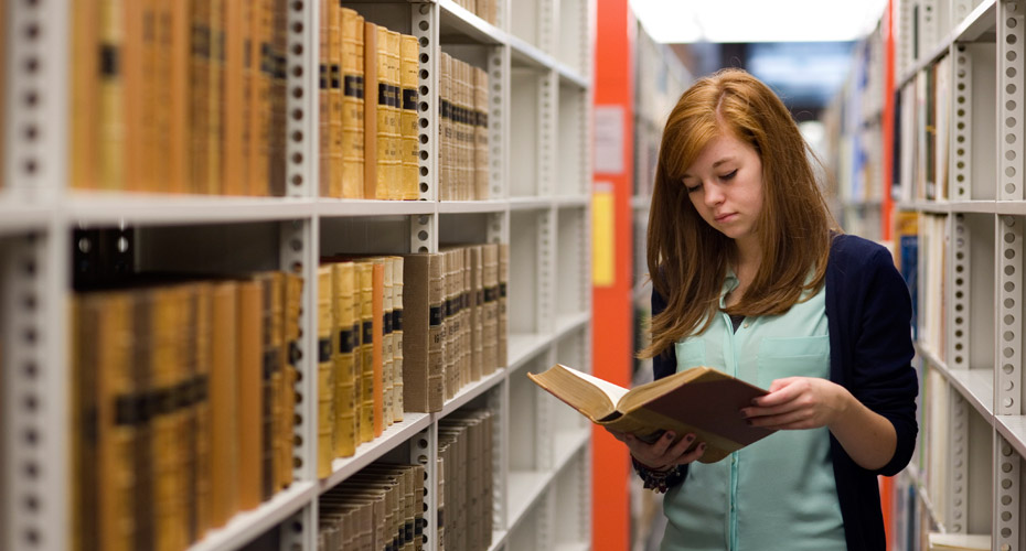 Student in the Lasok Law library